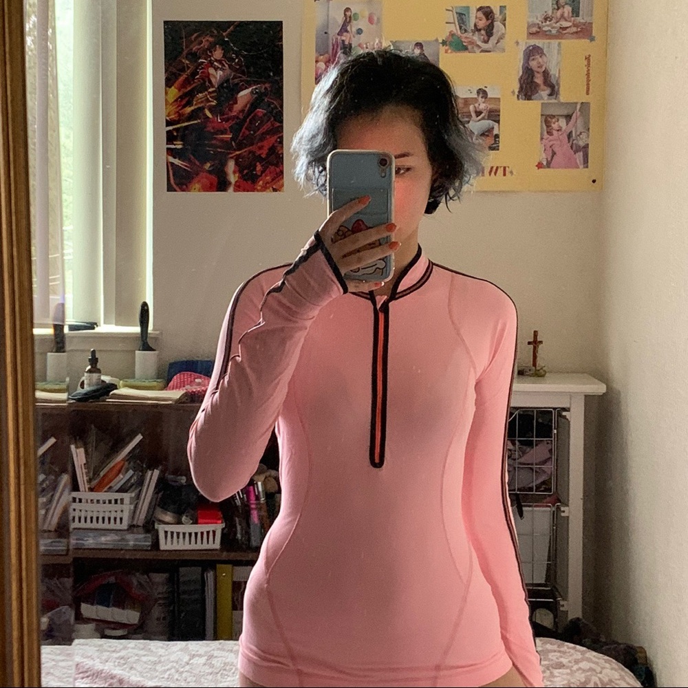 Pink lululemon long sleeve athletic top.